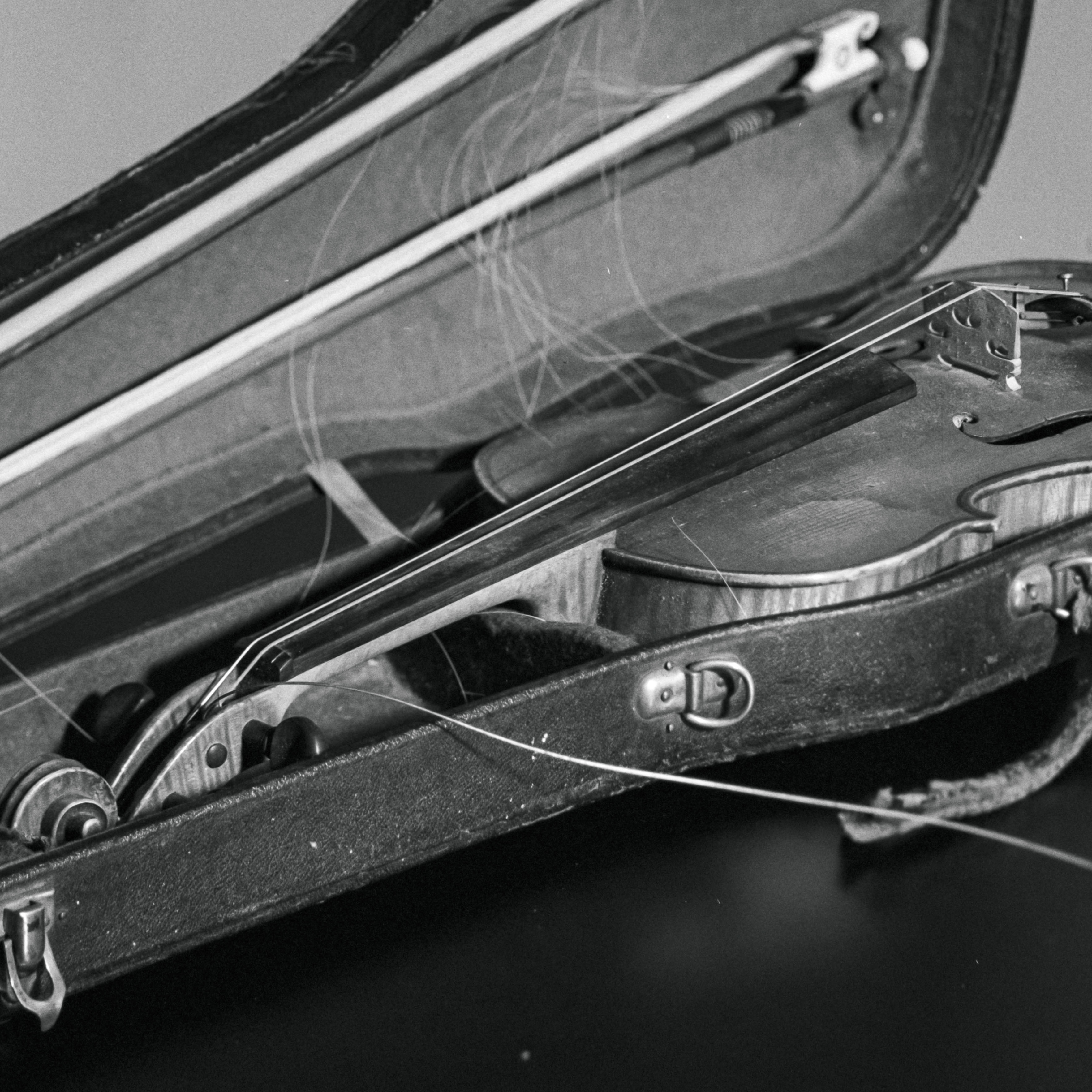 Old violin, analogue with technical camera